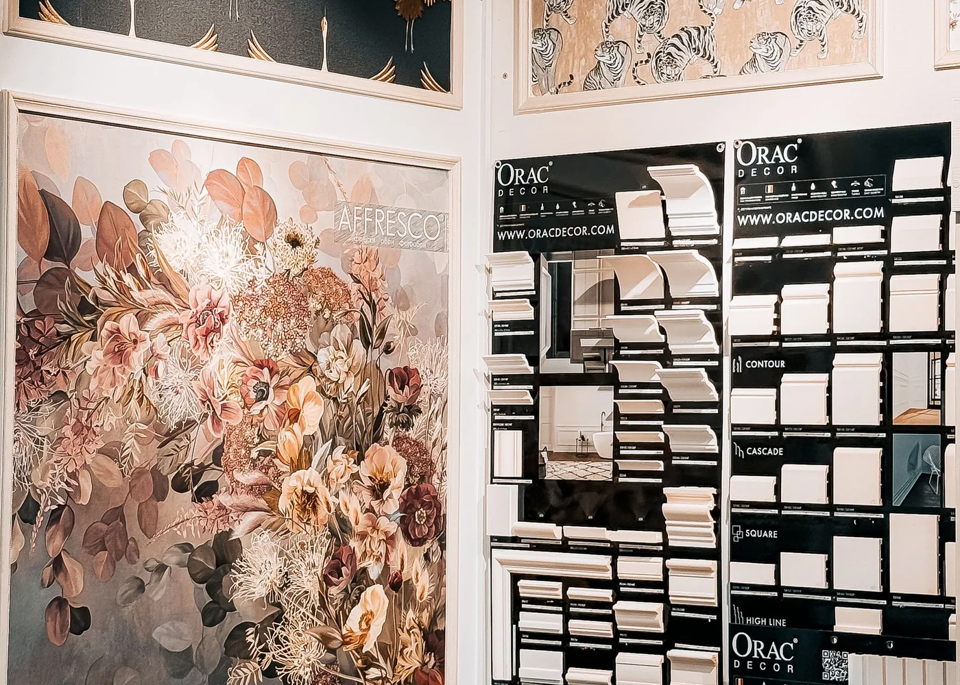 A home workspace with fabric samples, a notebook, and natural light